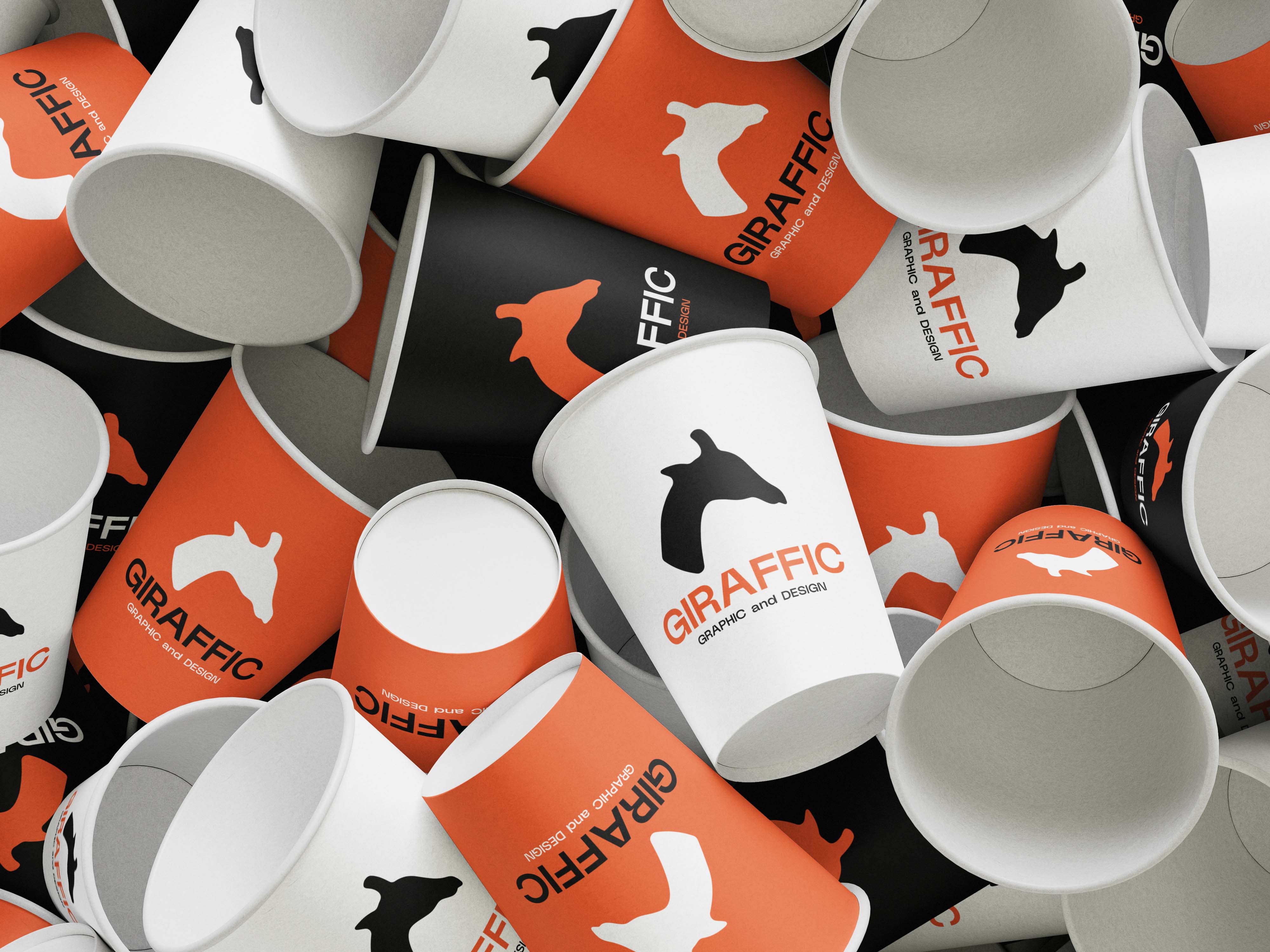 GIRAFFIC orange, black and white identity applied to coffee cups
